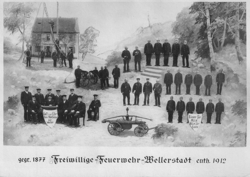 Mannschaftsbild der Freiwilligen Feuerwehr Wellerstadt von 1912 im Saal des Gasthauses Zur Sonne